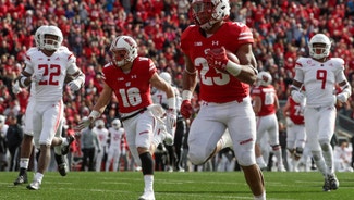 Next Story Image: Wisconsin runs away from Rutgers 31-17, Taylor with 3 TDs